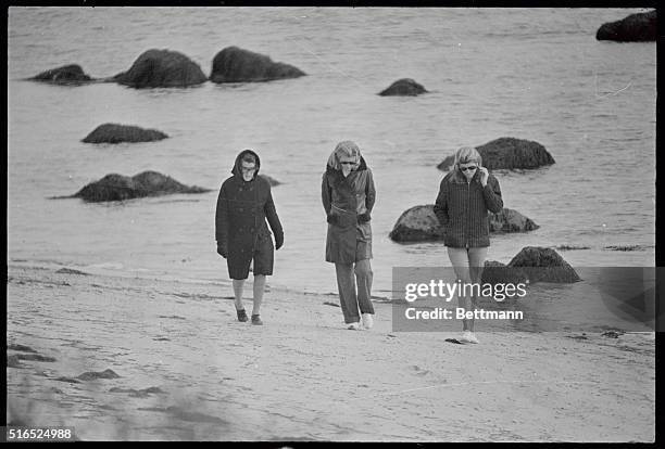 Mrs. Rose Kennedy walks along the beach with her daughter Mrs. Steven Smith and Mrs. Patricia Lawford. Mrs. Kennedy had become a widow hours earlier...