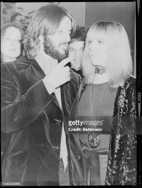 Beatle Ringo Starr and his wife arrive at the Odeon Theater for the charity premiere of the film, The Magic Christian.