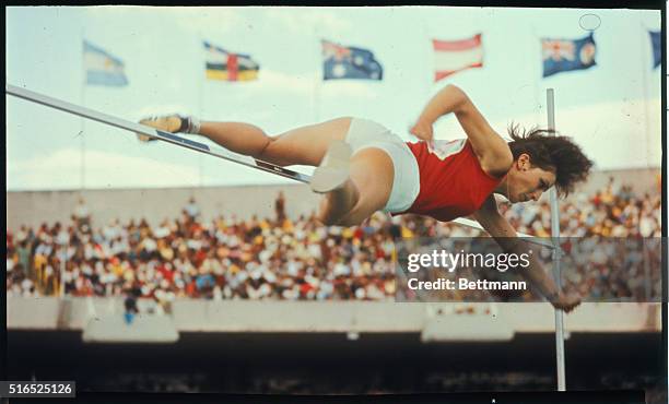 Mexico City: Miloslava Rezkova of Czechoslovakia goes over bar on her way to winning the Gold medal in the Women's High Jump event of the 1968...