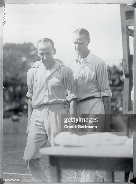 Melbourne, Australia: Tennis elimination matches in Australia for Davis Cup challengers. P. O'Hara Wood and J.O. Anderson, close ups.