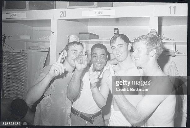 Shea Stadium: Left to right: Ken Boswell, Tommie Agee, Nolan Ryan and Wayne Garrett celebrate after the third game in the National League playoffs....