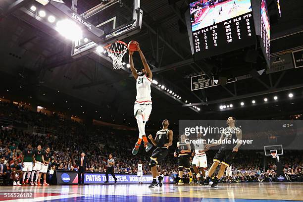 Kamari Murphy of the Miami Hurricanes dunks the ball in the second half against the Wichita State Shockers during the second round of the 2016 NCAA...