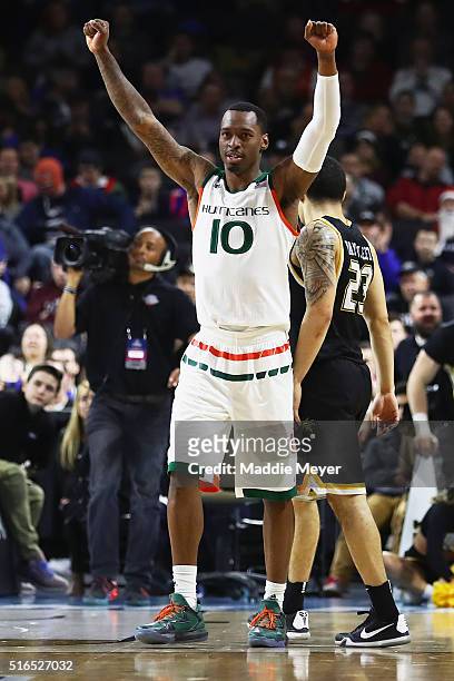 Sheldon McClellan of the Miami Hurricanes celebrates defeating the Wichita State Shockers 65-57 during the second round of the 2016 NCAA Men's...