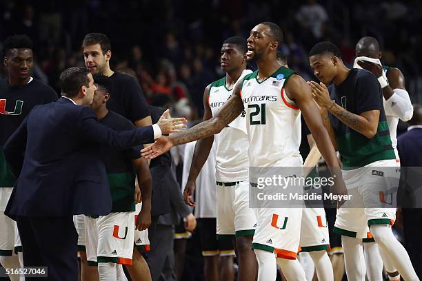Kamari Murphy of the Miami Hurricanes celebrates defeating the Wichita State Shockers 65-57 during the second round of the 2016 NCAA Men's Basketball...