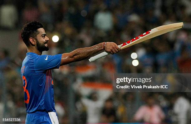 Virat Kohli of India celebrates after India won during the ICC World Twenty20 India 2016 match between Pakistan and India at Eden Gardens on March...