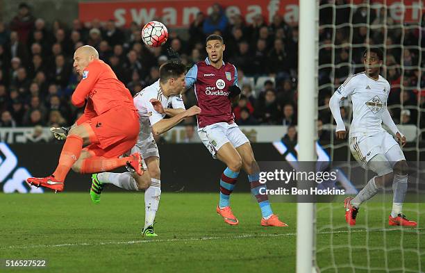 Federico Fernandez of Swansea City scores his team's first goal during the Barclays Premier League match between Swansea City and Aston Villa at...