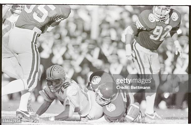Pasadena, California: USC outside linebacker Jack Del Rio sacks Ohio State quarterback Mike Tomczak and Tomczak fumbles. The fumble was eventually...