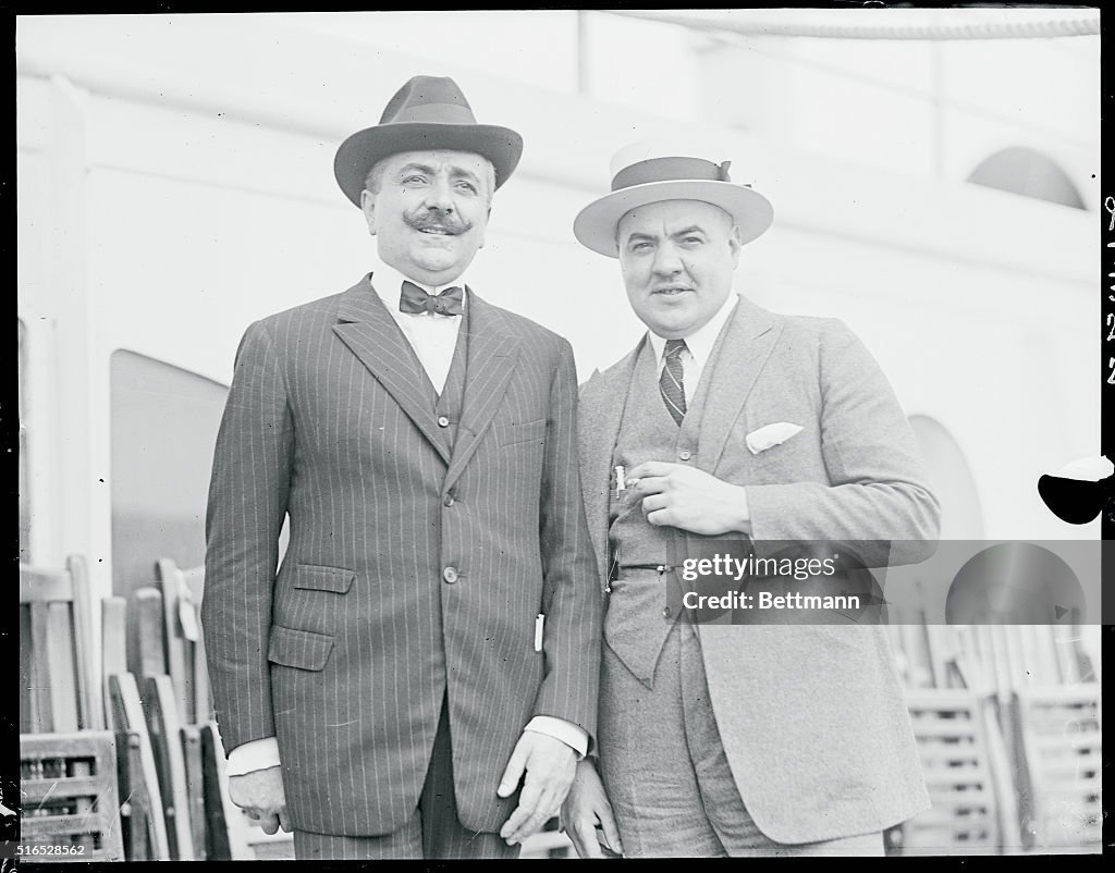 Movie Executive Posing With Liner Executive on Deck