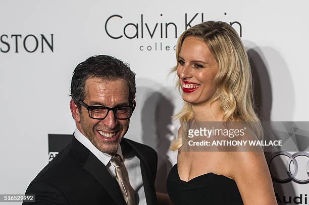 Czech model Karolina Kurkova and US designer Kenneth Cole pose on the red carpet before the 2016 American Foundation for AIDS Research Hong Kong gala...