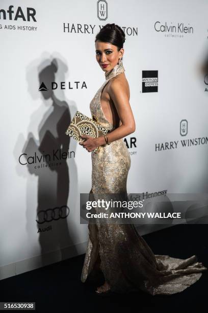 Amanda S poses on the red carpet during the 2016 American Foundation for AIDS Research Hong Kong gala at Shaw Studios in Hong Kong on March 19, 2016....