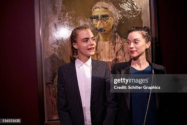 Cara Delevingne and Annie Clark attend the 'Jonathan Yeo Portraits' exhibition opening at the Museum of National History at Frederiksborg Castle on...