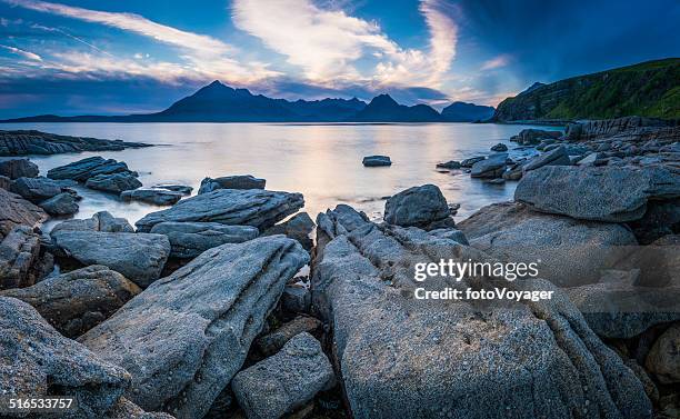 rocky beach blue ocean sunset dramatic mountain peaks highlands scotland - schotland stock pictures, royalty-free photos & images