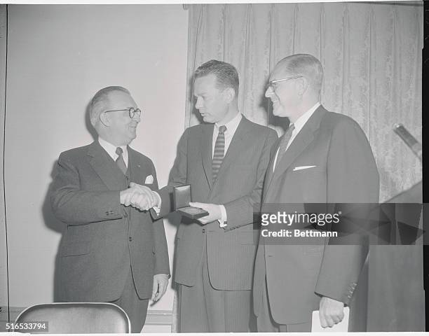 Photo shows David Brinkley as he is presented the Peabody Award for Television News, NBC News by Dean John E. Drewry of the University of Georgia's...