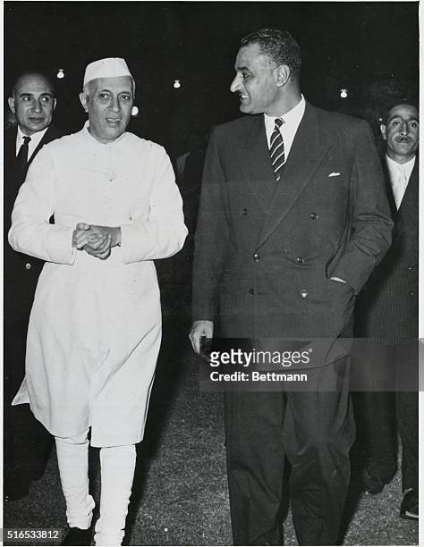 Pandit Nehru , Prime Minister of India shown with Colonel Nassar, the Egyptian Prime Minister during Nassar's visit to New Deli, on his way to...