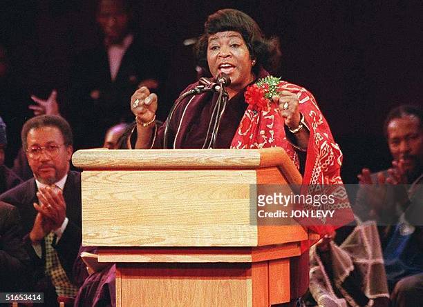 This file photo taken 06 May 1995 shows the widow of Malcolm X, Betty Shabazz, speaking at the Apollo Theater in Harlem, New York, at a Nation of...