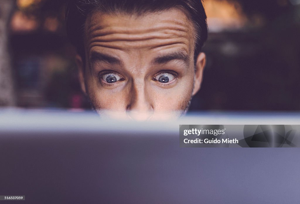 Man using tablet pc.