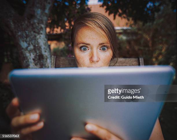 woman using tablet pc. - faszination stock-fotos und bilder