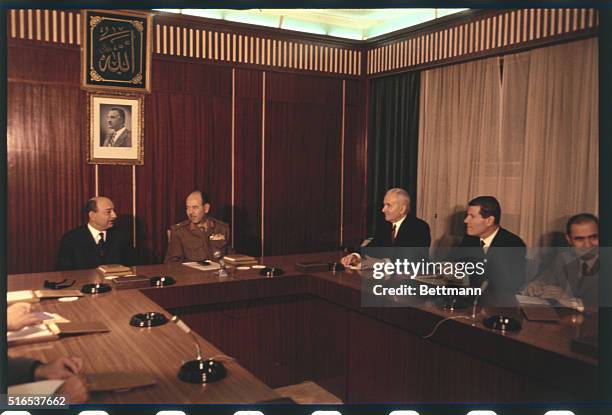 Cairo, U.A.R. Seated around the table at the opeing of the PLO/Lebanese negotiations in Catro are U.A.R. Foreign minister Mahmoud Riad ; U.A.R. War...