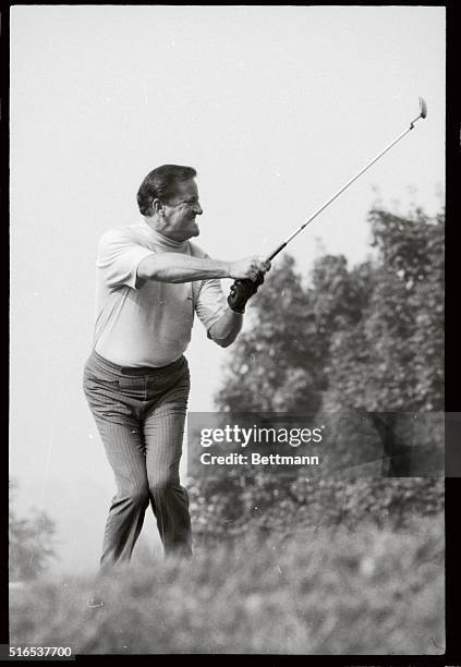 Senior U.S. Champion Tommy Bolt puts a lot into his putt on the first green at the beginning of the second round of the Westchester Classic August 1,...