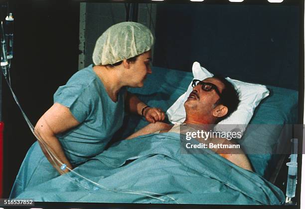 Houston, Texas: Haskell Karp, 47 of Skokie, Ill.; first person ever to receive a total replacement of a human heart by a mechanical device, lies in...