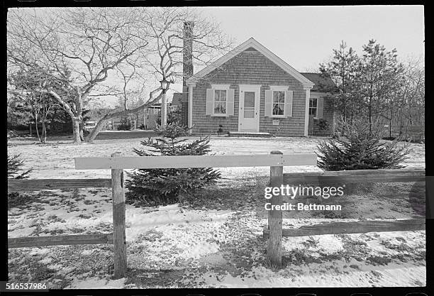 Edgartown, Mass.: A board across the entrance and a no trespassing sign on the house, is the winter appearance of the house at Edgartown where...