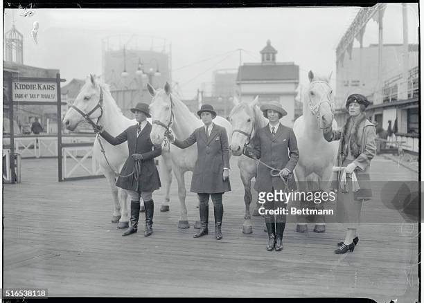 Society Circus Committee for Park Avenue street fair receives instructions at Luna Park on how to run a circus. Four of the prominent society women...