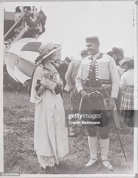 The Serbian Royal Wedding. English lady talking to a visitor from Hertzogovina.