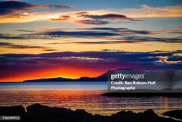 sunset over skye as viewed from mallaig - mallaig stock pictures, royalty-free photos & images