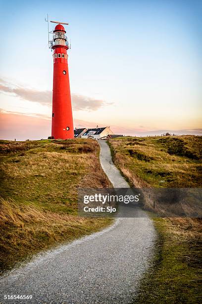 lighthouse in the dunes - red beacon stock pictures, royalty-free photos & images