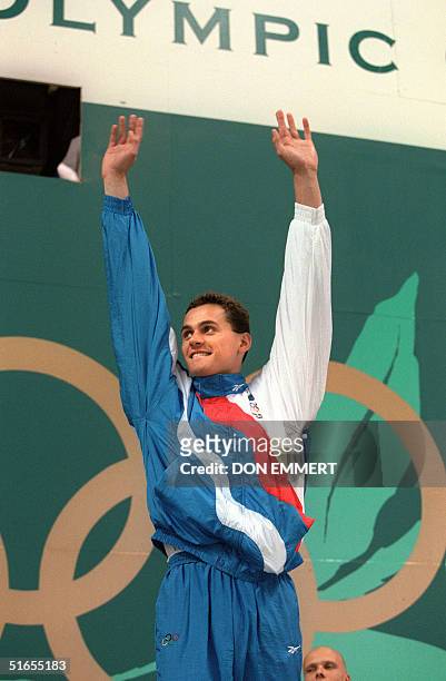 Alexander Popov from Russia celebrates his gold medal win in the Men's 50m freestyle event, Atlanta, 25 July 1996. Popov clocked a time of 22.13...