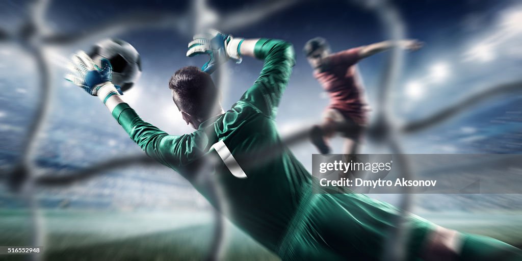 Soccer game moment with goalkeeper