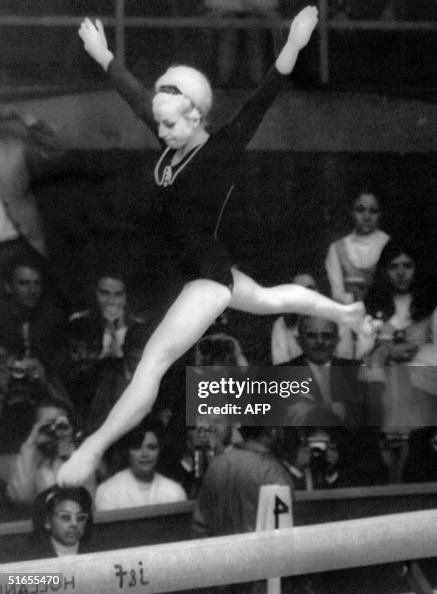 Czech Vera Caslavska performs her routine on the b Czech Vera Caslavska performs her routine on the b