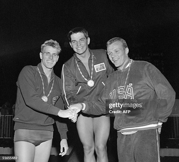 The three Australian winners of the 1.500 m freestyle, Murray Rose , Jon Konrads and Breen congratulate each other at the Olympic Games in Rome, 04...