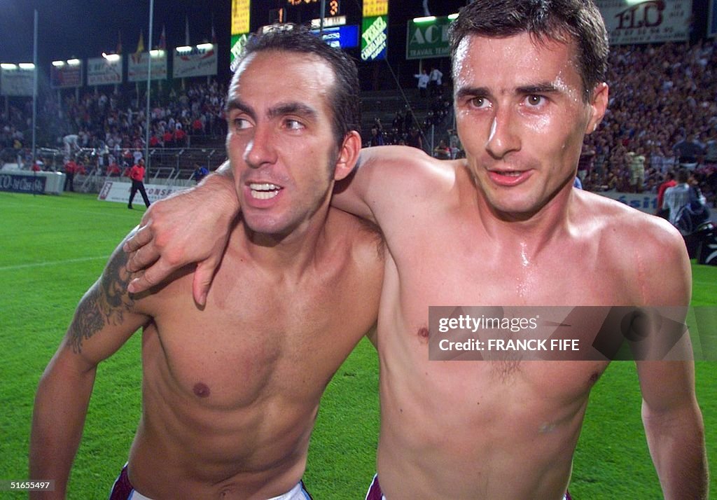 West Ham players Paolo Di Canio (L) and Marc Kelle