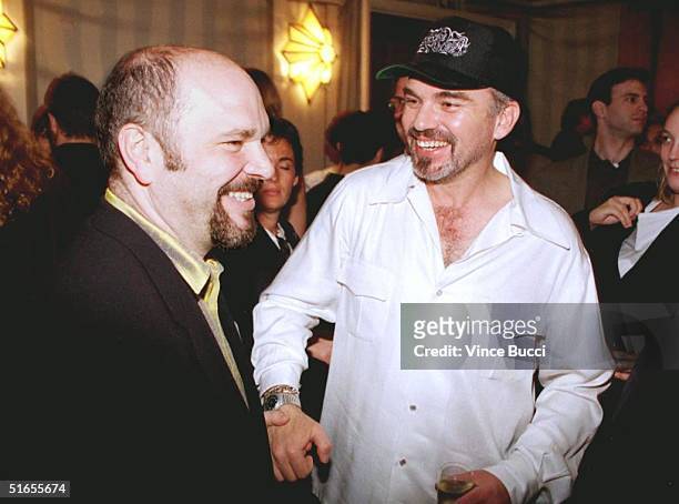 Director Anthony Minghella and actor Billy Bob Thornton laugh during the British Academy of Film and Television Arts' annual Tea Party 22 March in...