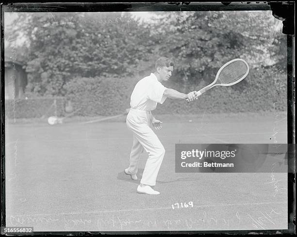 Following negatives were especially posed for International News Service by Maurice McLaughlin, national tennis champion and star of the American...