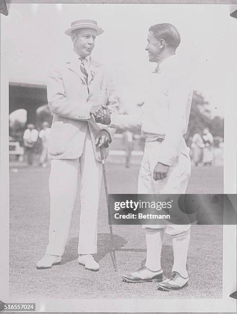 Chicago, IL.: Twenty-one year old Gene Sarazen, professional at the Highland Country Club of Pittsburgh, at right, receiving congratulations of Mr....