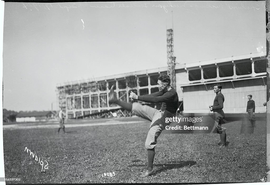 Football Player Practicing His Kicking