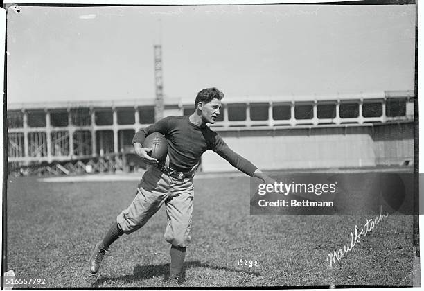 University of Michigan Football practice a Ferry Field, Ann Arbor, Michigan. Sept. 1914. Photo shows John Maulbetsch, All American Halfback.