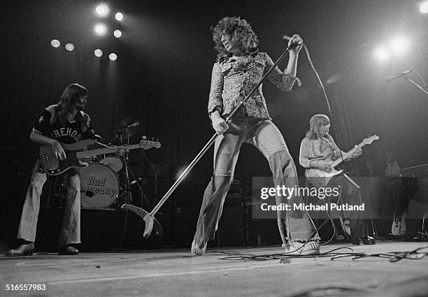 English rock group Bad Company peforming on stage, 8th April 1974. Left to right: Boz Burrell , Paul Rodgers and Mick Ralphs.