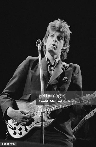 Singer-songwriter Nick Lowe performing with English pub rock band Brinsley Schwarz, April 1974.