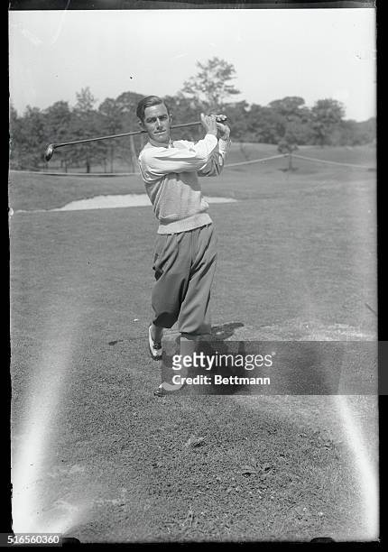 Opening the National Open Golf Championship...Johnny Farrell, the defending champion, pictured just before he started around the course at the...