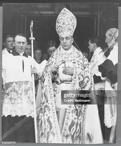 His Grace, the Most Reverend Dr. Byrne, Archbishop of Dublin, blessing the people from the steps of the Pro Cathedral after his induction to the See.