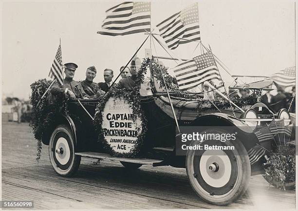 Tacoma, Washington: Eddie Rickenbacker , World War I flying ace rides in a parade in Tacoma, as an honored guest.