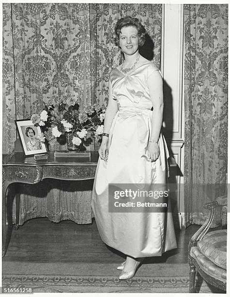 In Borrowed Finery. Princess Margrethe, heir to the Danish throne, wears a borrowed gown for the dinner-dance she is giving in celebration of her...