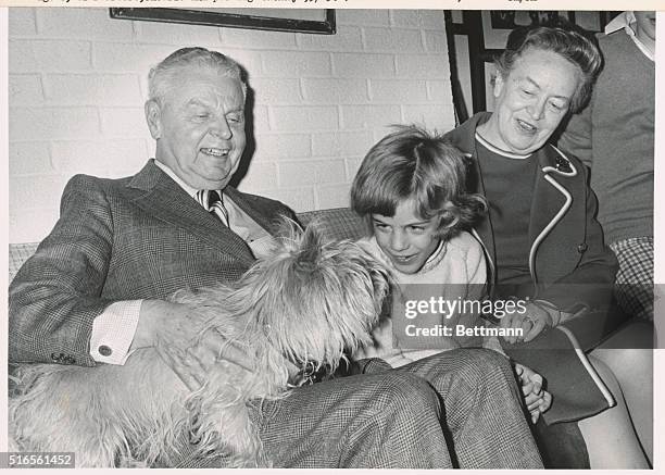 Ottawa: Former Prime Minister John Diefenbaker celebrates his 34th year as a member of the House of Commons. He is shown at home with his wife Olive...