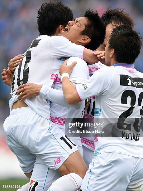 Hiroyuki Taniguchi of Sagan Tosu celebrates scoring his team's first during the J.League match between Yokohama F.Marinos and Sagan Tosu at the...