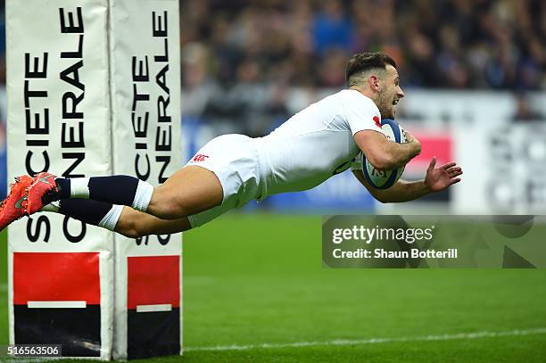 Danny Care of England dives over to score the opening try during the RBS Six Nations match between France and England at the Stade de France on March...