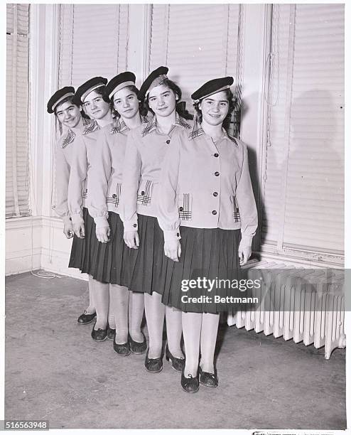 The Quintuplets Posing in their sailor outfits.