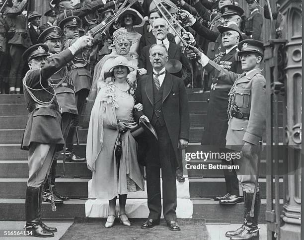 Governor and Mrs. Al Smith with Mr. And Mrs. G. Foster Warner leaving the church after Warner-Smith marriage.